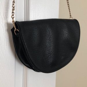 Her shoulder clutch purse